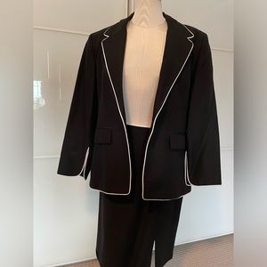 Ladies black suit with white piping